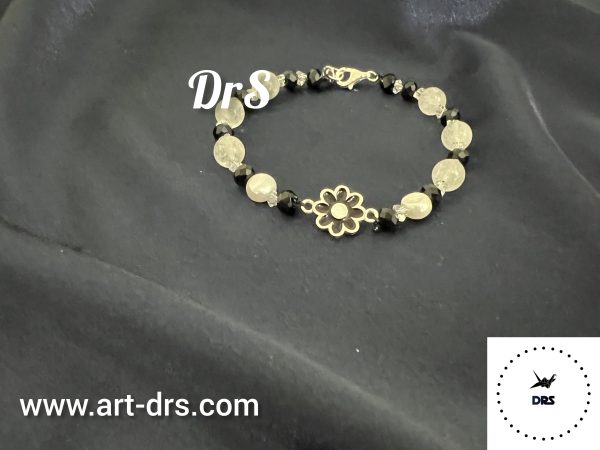 دستبند نقره با پلاک بابونه