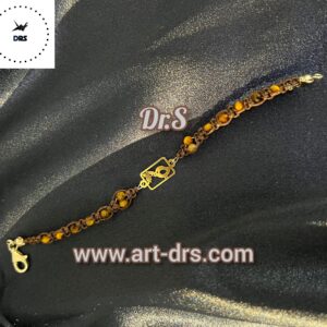 دستبند طلا پلاک طرح پرنده با سنگ چشم ببر برند دیارس